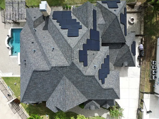 Aerial view of a shingle roof and its intersecting roof planes